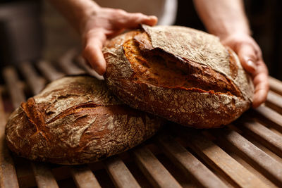 Close-up of hand holding bread