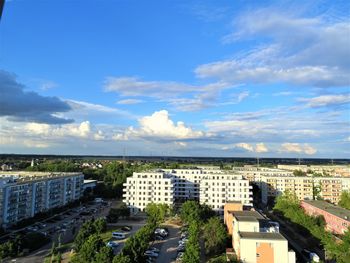 High angle view of buildings against sky