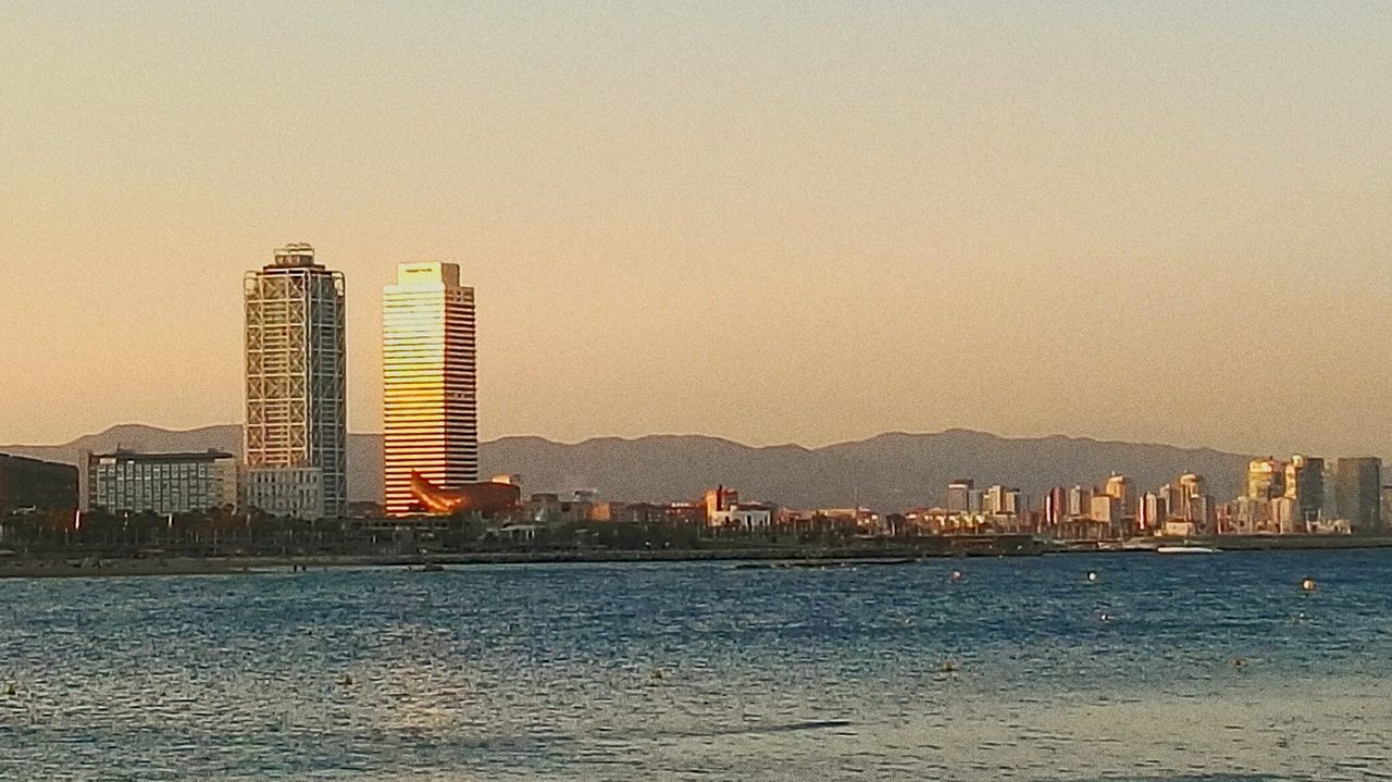 VIEW OF CITY AT WATERFRONT