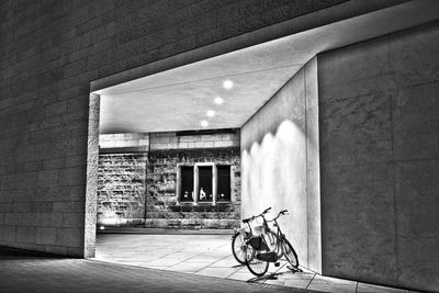 Bicycle parked in front of building