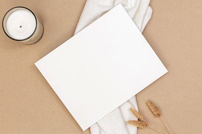 Directly above shot of blank adhesive note on table