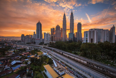 High angle view of traffic on road at sunset