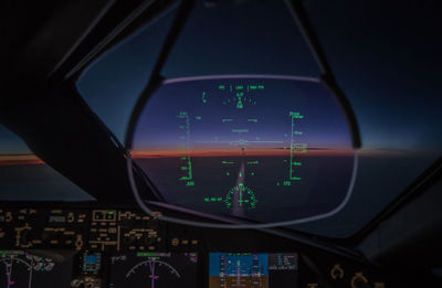 View of airplane at airport runway