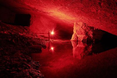 Illuminated red water at night