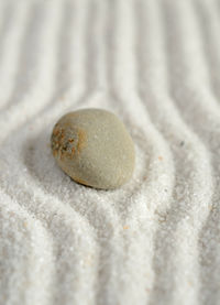 High angle view of stones on pebbles