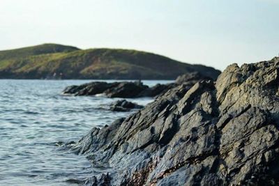 Scenic view of rock formations in river