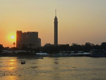 View of buildings against sky during sunset