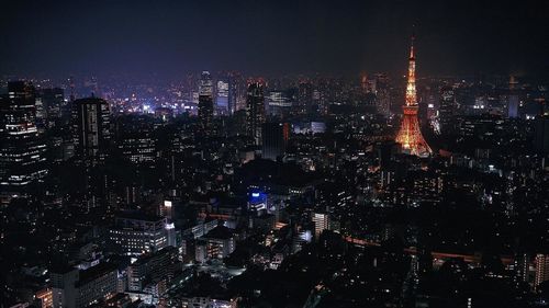 Illuminated cityscape at night