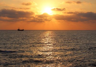 Scenic view of sunset over sea