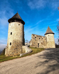 Low angle view of castle against blue sky