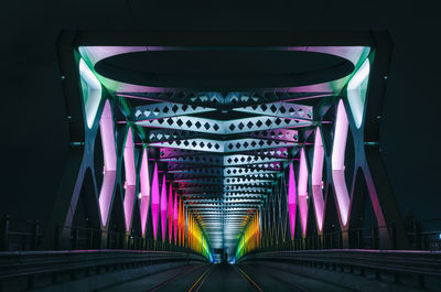 View of illuminated bridge at night