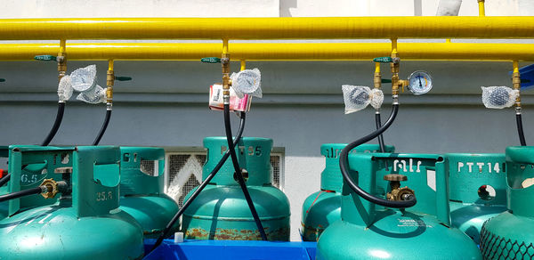 Close-up of green gas tank