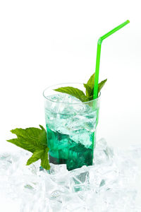 Close-up of drink against white background