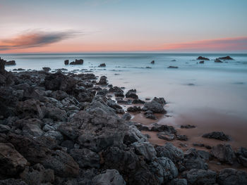 Scenic view of sea against sky during sunset