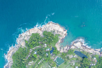 High angle view of city by sea