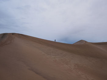 Scenic view of desert against sky