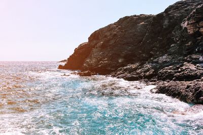 Scenic view of rock formation in sea