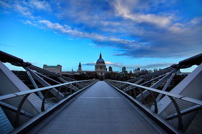 Footbridge over buildings in city