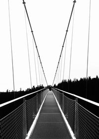 View of suspension bridge against clear sky