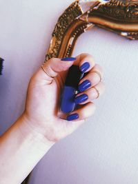 Close-up of woman holding hands