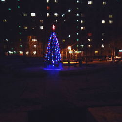 Illuminated city at night