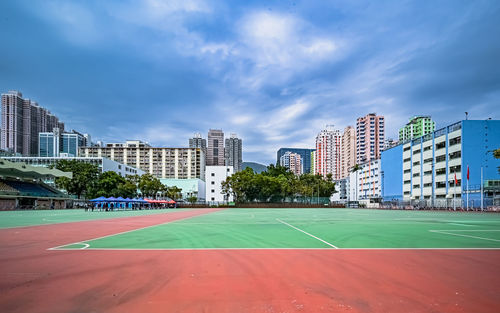 Buildings in city against sky