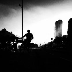 People walking on road in city