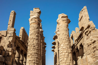 Different hieroglyphs on the walls and columns in the karnak temple.