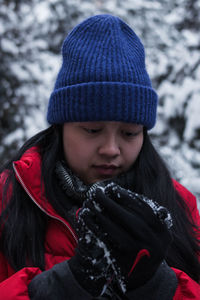 Close-up of woman wearing hat