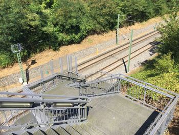 High angle view of steps amidst trees