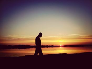 Scenic view of sea at sunset