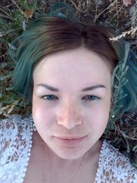 Close-up portrait of a smiling young woman