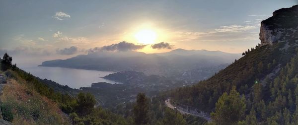 Panoramic view of mountains against sky during sunset