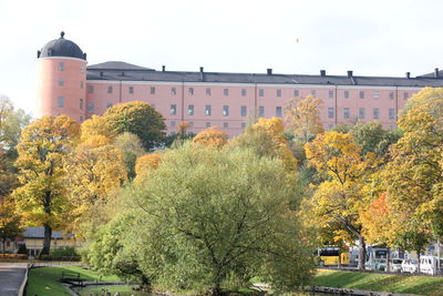 View of building with trees in foreground