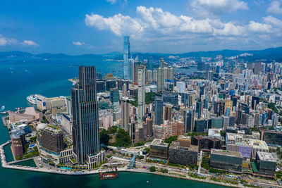 High angle view of buildings in city against sky