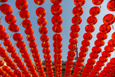 Low angle view of lanterns hanging in row