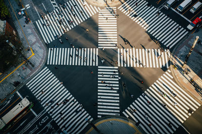 High angle view of cars crossing road