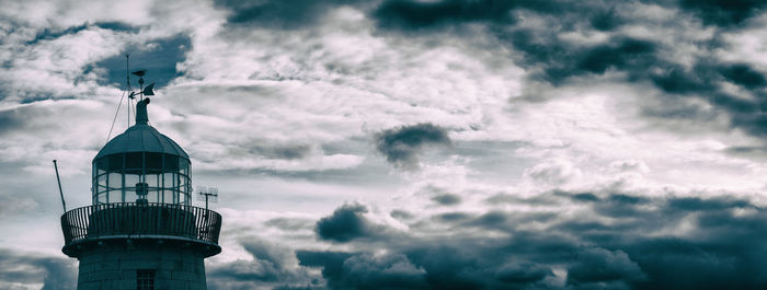 Low angle view of lighthouse against sky