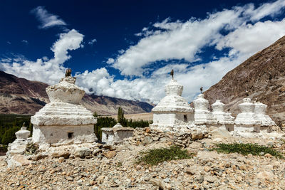 Whitewashed chortens tibetan buddhist stupas . nubra valley, ladakh, india