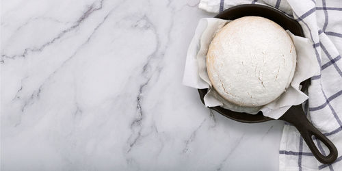 High angle view of egg in bowl on table