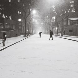 Woman walking on city street