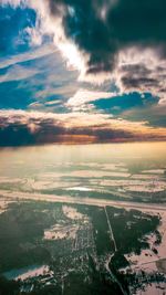 Aerial view of city during sunset