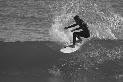 Man surfing in sea