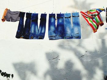 Clothes drying against wall