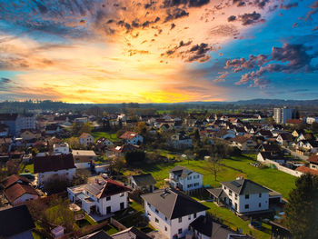 High angle view of townscape against sky during sunset