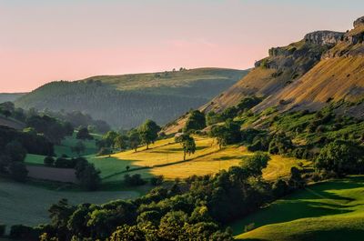 Scenic view of mountains against sky during sunset