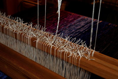 Close-up of loom at textile industry