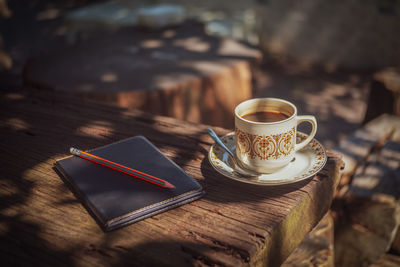 High angle view of coffee cup on table