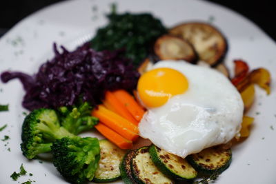 Close-up of breakfast served in plate