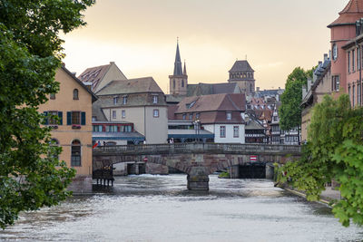 Idyllic waterside impression of strasbourg, a city at the alsace region in france at evening time